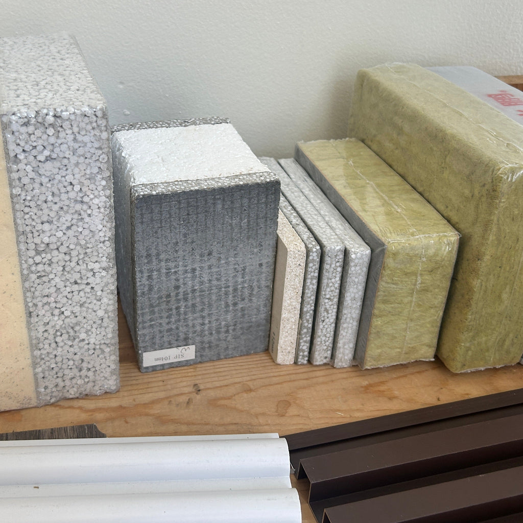 Various types of new light but strong building materials including concrete boards, insulations, structured insulated panels (SIPs) and exterior panel examples in extruded metal.