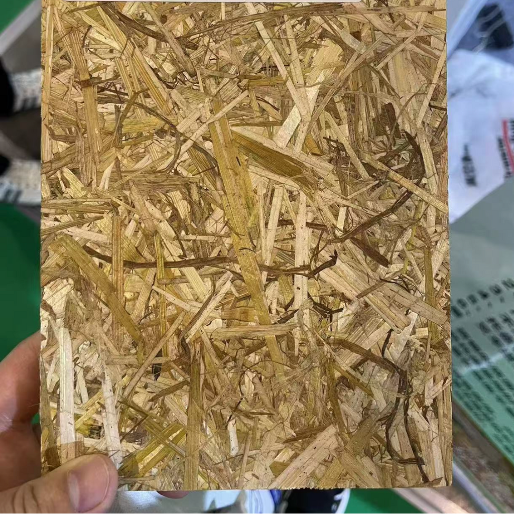 Zero Waste Wheat Stalk fiber board with a textured surface held by a hand